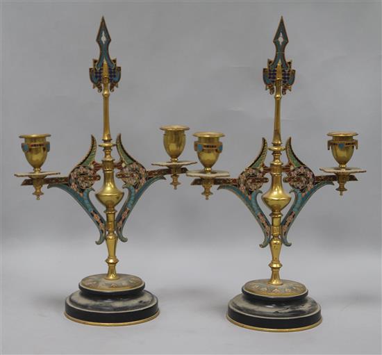 A pair of 19th century French ormolu and champleve candelabra 13.5ins